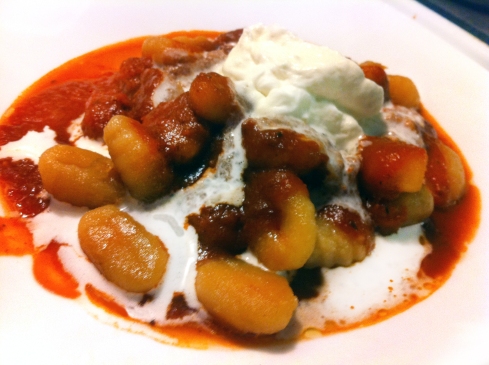 Gnocchi with roasted red pepper sauce and salted garlic whip cream